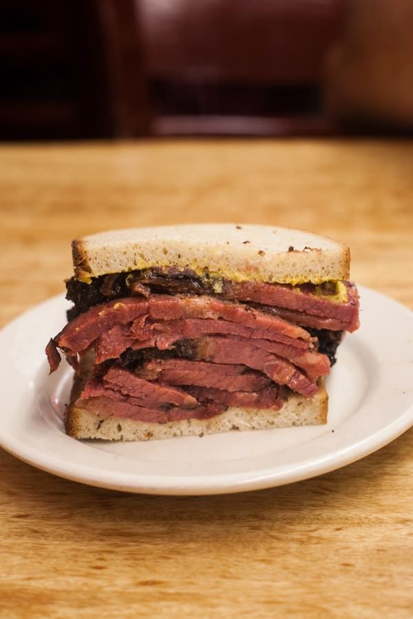Katz's Delicatessen in New York City: serving some of the BEST sandwiches in the entire city. Don't forget to try the pastrami, corned beef, and the knish. Full review at femalefoodie.com!