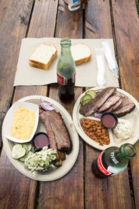 Micklethwait Craft Meats is a barbecue joint in the heart of Austin, Texas. Tom Micklethwait serves up classic smoked beef ribs, pulled pork, smoked sausages and more. Not only are there delicious meats, but sides that will knock your socks off. Buttermilk and Pecan Pies finish off the perfect Texas meal.