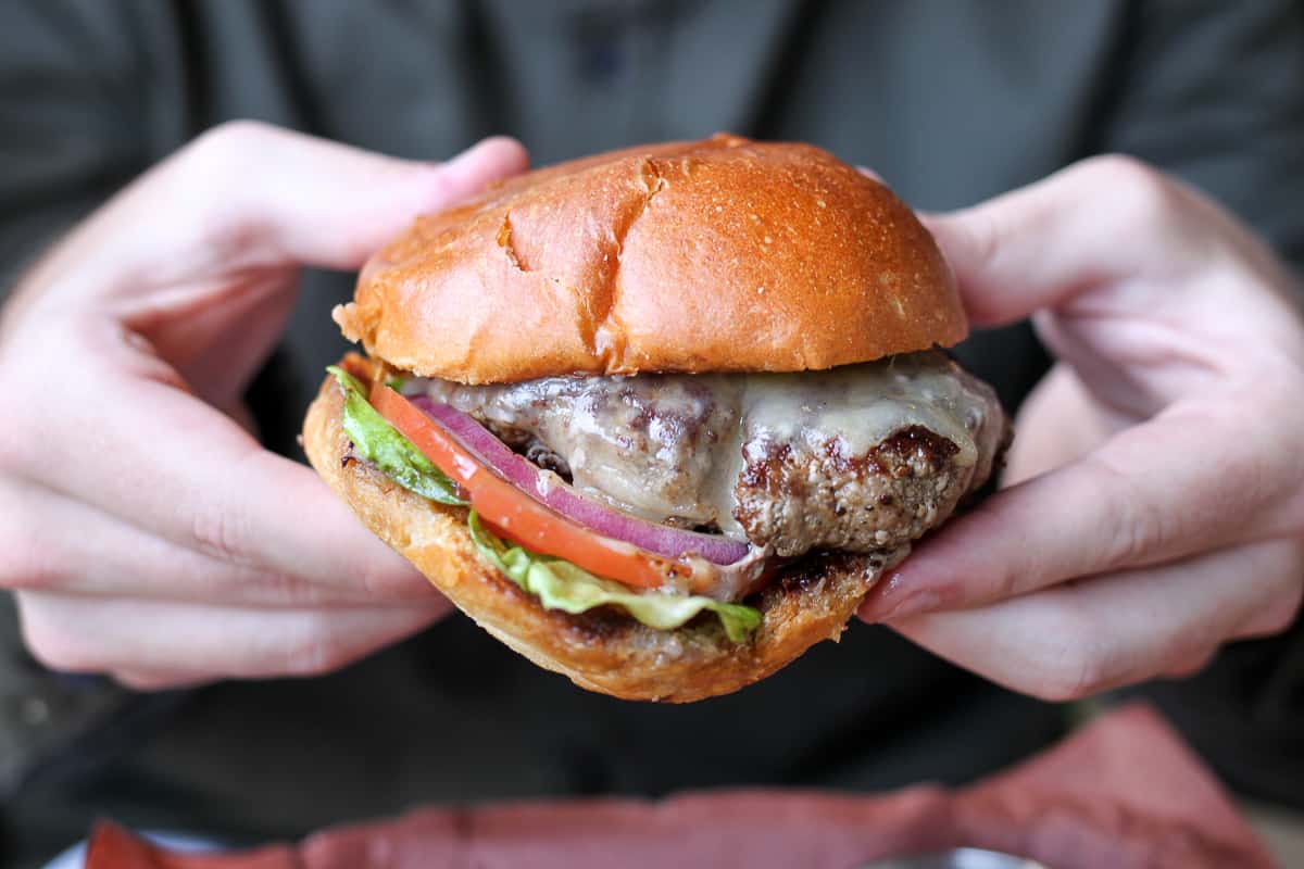 A comprehensive guide to the 25 best burgers in Austin, from high-end burgers to smash burgers, you're bound to find a new favorite!