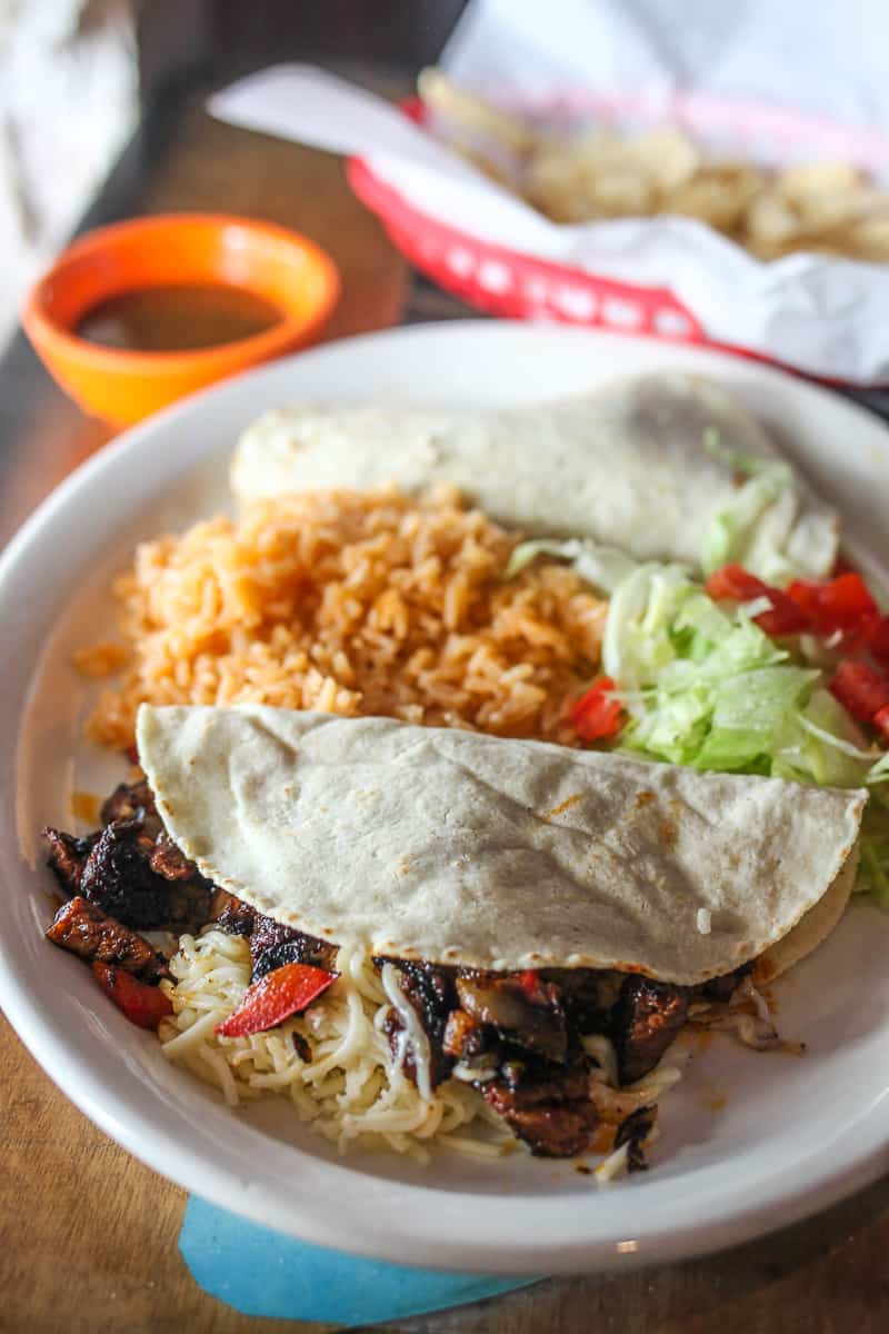 Polvos' steak taco: nicely charred and salty steak, plenty of melty jack cheese, finished off with sweet grilled peppers.