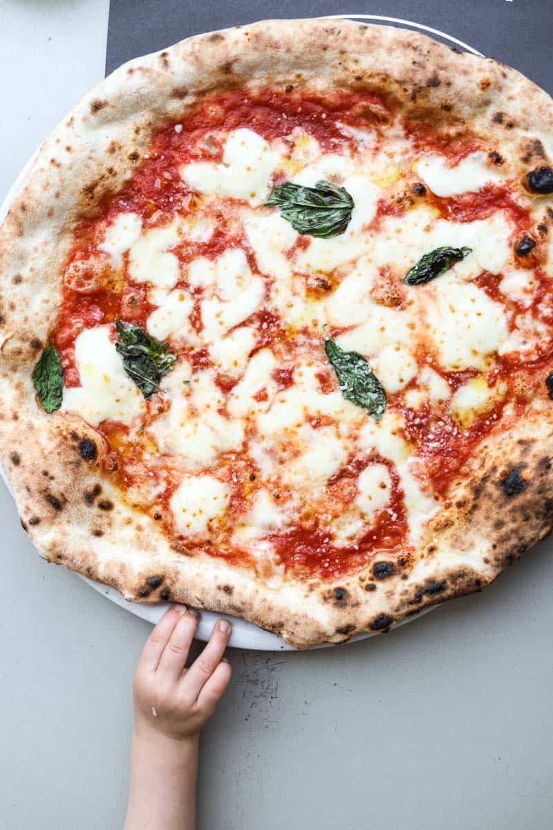 If you're in Naples for even a day then you're undoubtedly looking for the best Naples pizza. Sharing 3 amazing spots for the best pizza in Naples, Italy!