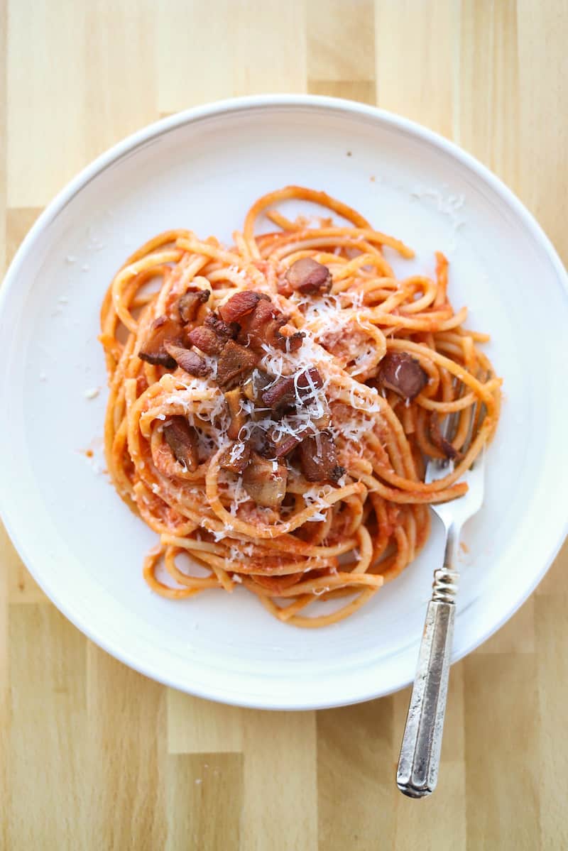 Bucatini all'Amatriciana on plate with fork