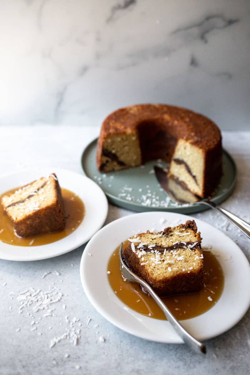 two slices of Coconut Coffee Cake with Homemade Caramel Sauce