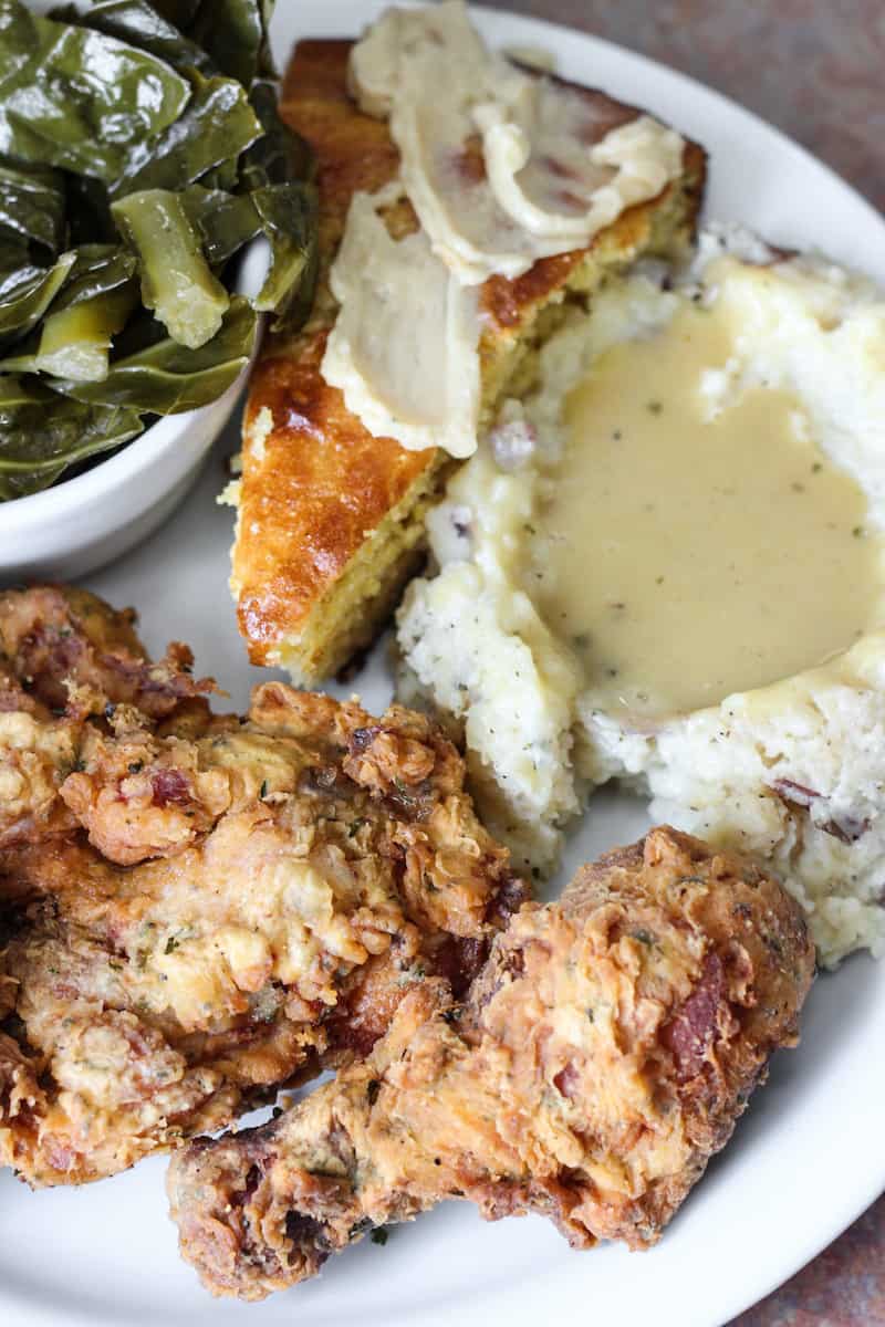 Fried chicken with a side of mashed potatoes by Sauce Boss Southern Kitchen