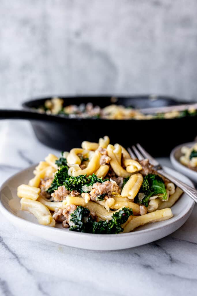 sausage kale pasta on plate