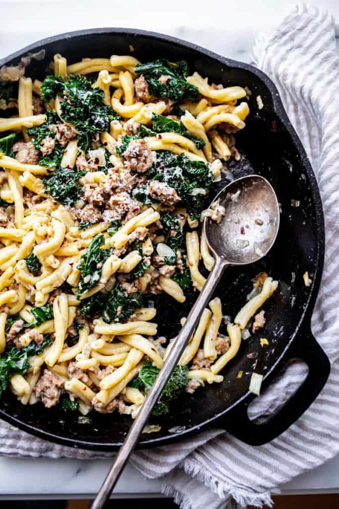 sausage kale pasta in skillet