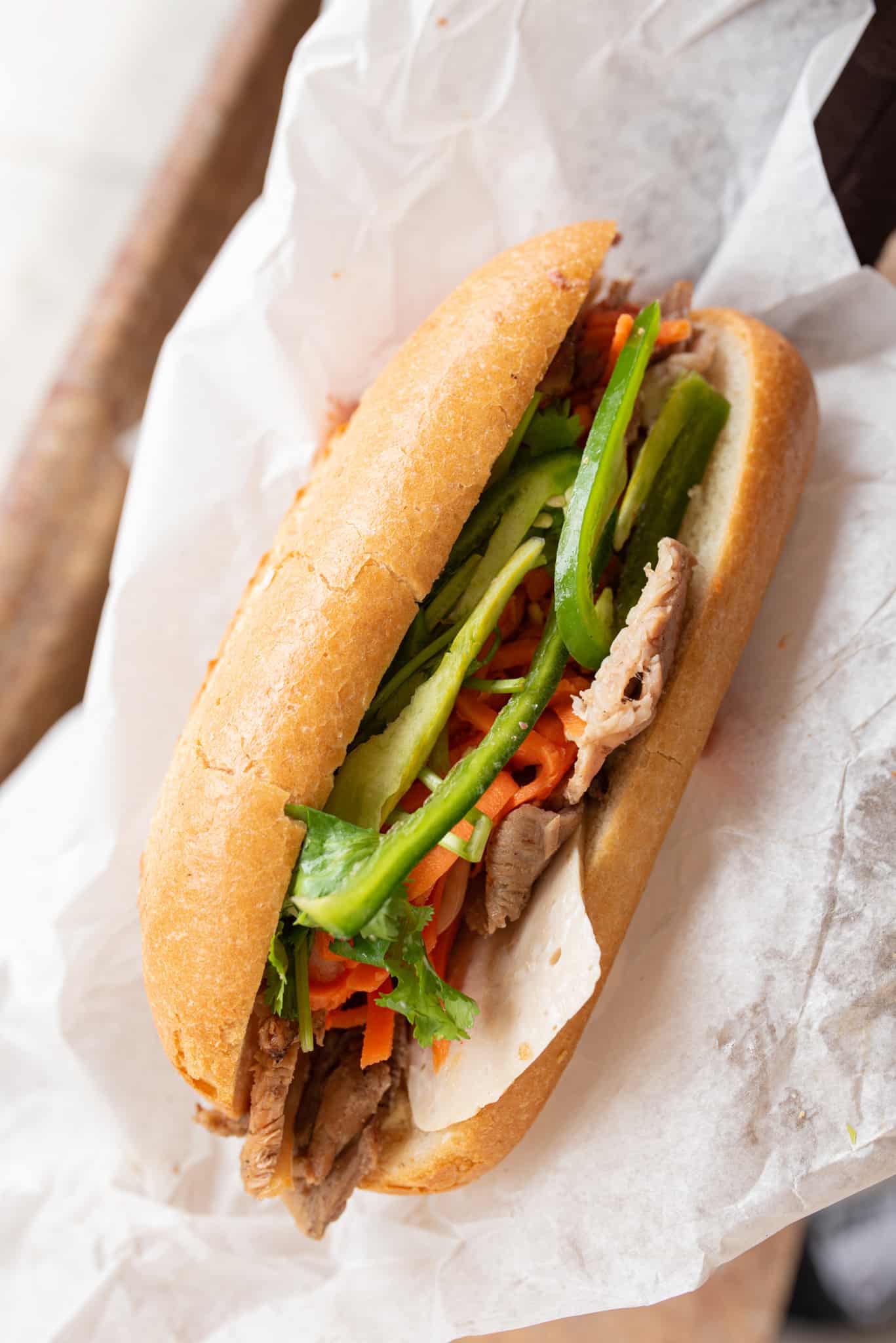 Saigon Sandwich's Banh Mi- steamed and roasted pork, pate, carrots, and jalapenos on a fresh French roll