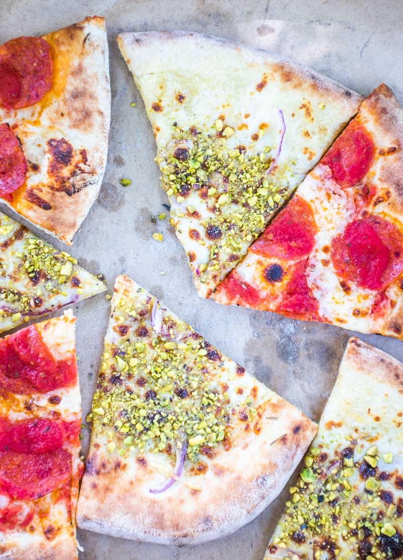 slices of pistachio pizza and classic pepperoni by Fiore - Best Pizza in Salt Lake City