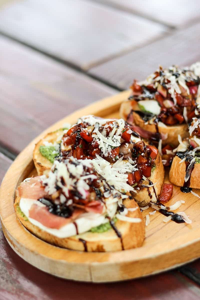 Bruschetta loaded with pesto, fresh tomato, basil, olive oil, and balsamic glaze by Cafe Galleria, Heber Restaurants