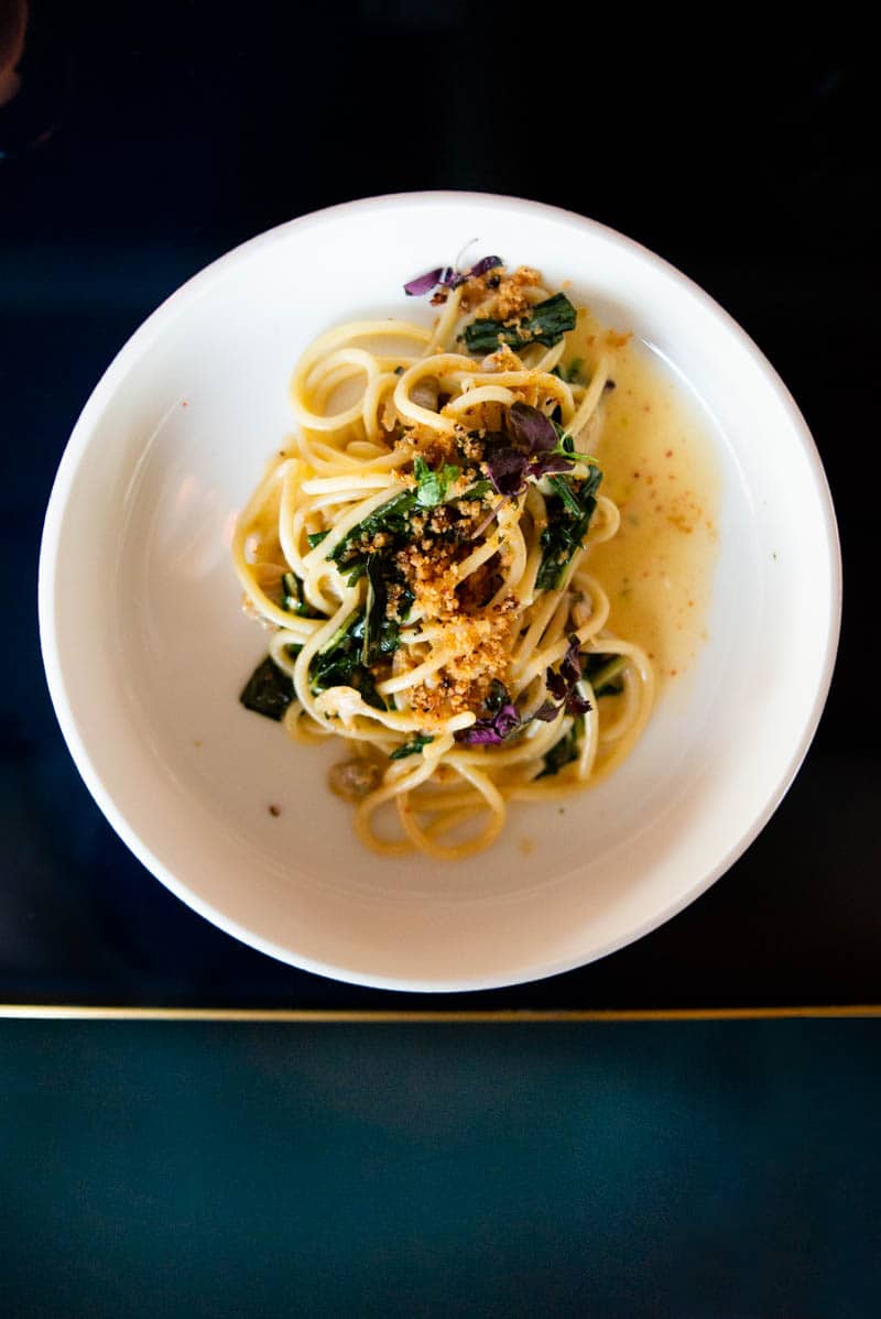 italian restaurants in Phoenix: Fat Ox's saffron spaghetti with steamed clams, guanciale, and topped with crispy breadcrumbs