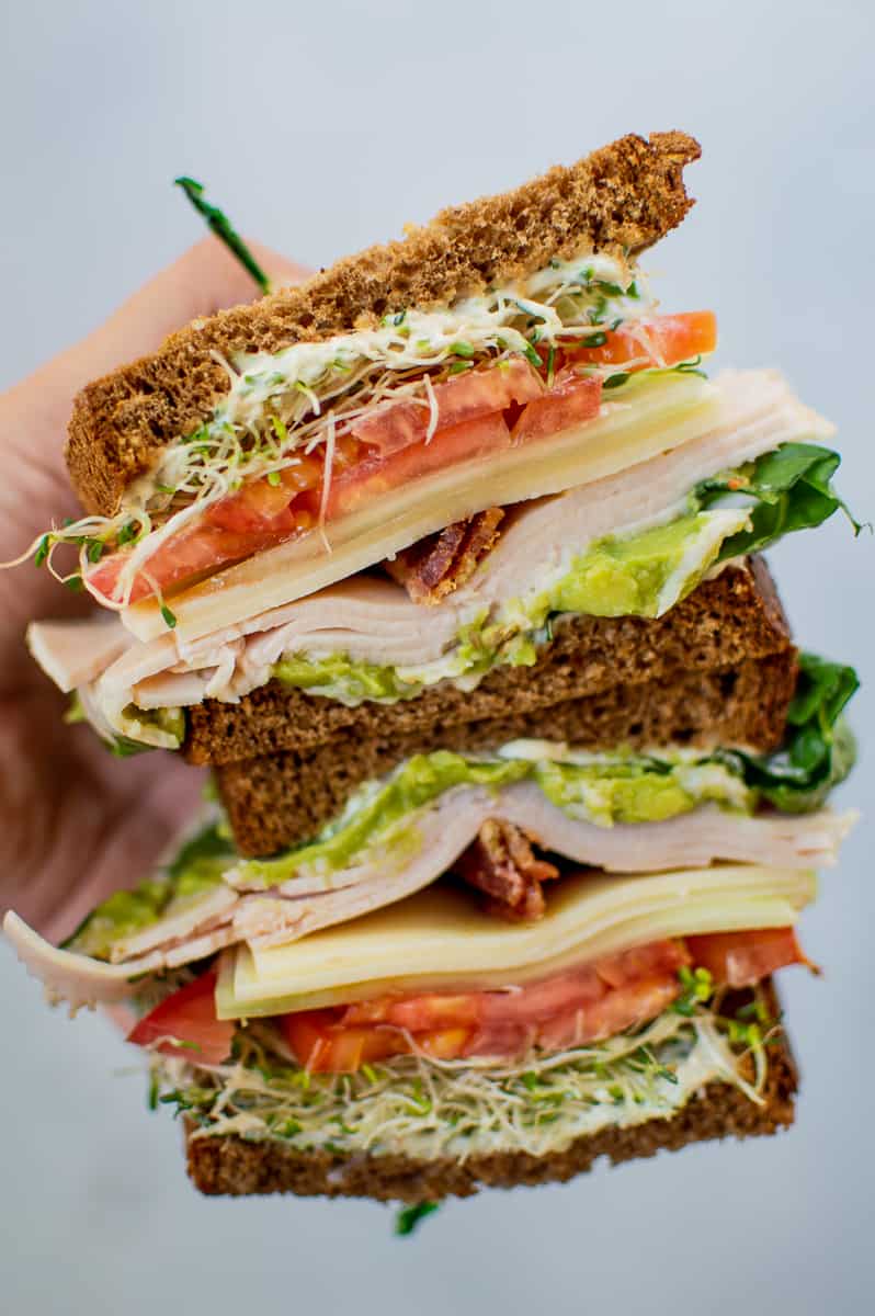 best restaurants in Irvine: The Avocado Cafe's Kissel sandwhich- Squaw bread with turkey, bacon, cheddar, tomato, cucumber, sprouts, mayo, and of course, avocado