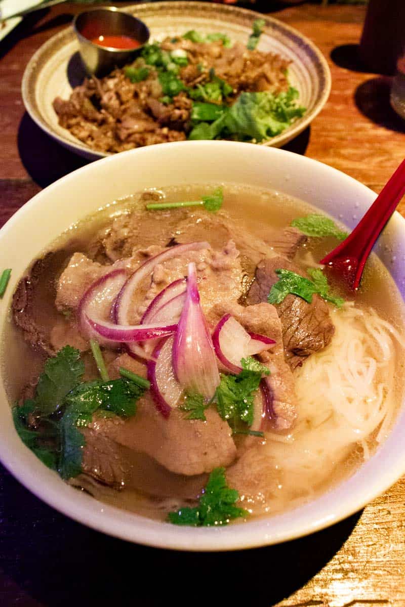 Best restaurants in Times Square: OBAO's Pho Bò’s 12-hour stewed beef broth with thin-sliced rare beef, brisket, and rice noodles