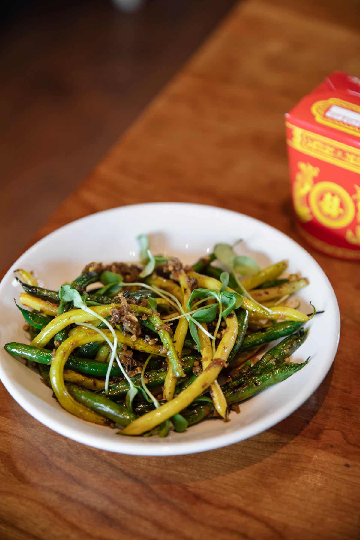 best restaurants in denver: hop alley's beijing duck roll or grilled xo beans