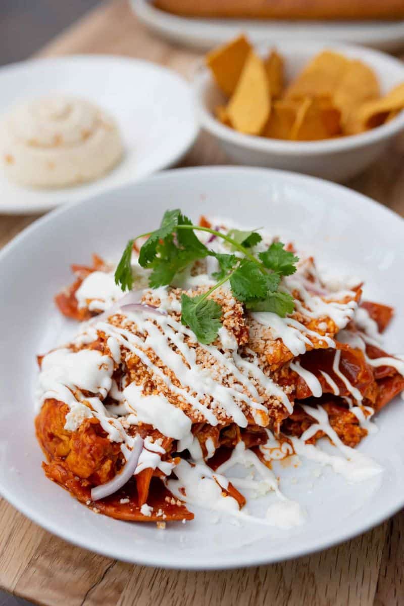 chilaquiles- made with house-made tortilla chips, fluffy scrambled eggs, and a salsa made from guajillo and arbol chiles by Nopalito