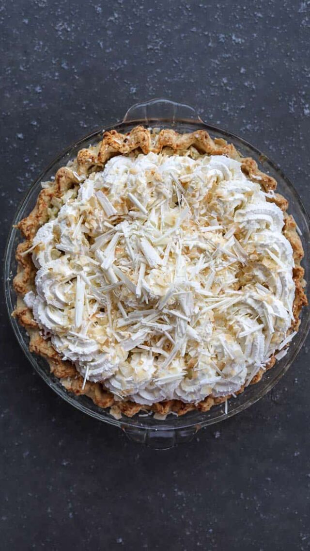 TRIPLE COCONUT CREAM PIE 🥥❤️  COCONUT PIE CRUST  1 cup plus 2 Tablespoons all-purpose flour
1/2 cup shredded sweetened coconut
8 Tablespoons cold unsalted butter
2 teaspoons granulated sugar
1/4 teaspoon kosher salt
1/3 cup ice-cold water  COCONUT PASTRY CREAM  1 cup milk (whole preferred)
1 cup canned unsweetened coconut milk
2 cups shredded sweetened coconut
1 vanilla bean, split in half lengthwise
2 large eggs
1/2 cup plus 2 Tablespoons sugar
3 Tablespoons all-purpose flour
4 Tablespoons room-temperature unsalted butter  WHIPPED CREAM & TOPPINGS  2 1/2 cups heavy whipping cream
1/3 cup sugar
1 teaspoon pure vanilla extract
pinch kosher salt (optional)
2 ounces unsweetened chip or large-shred coconut
4-6 ounces white chocolate in chunk  Get the full, swoon-worthy recipe courtesy of the @dahliabakery on femalefoodie.com (click our “recipes” link in bio @femalefoodie or google “female foodie coconut pie”).  #femalefoodie #femalefoodierecipe #coconutcreampie #coconutmilk #coconutdessert #creampies #thanksgivingpie #thanksgivingdesserts #dahliabakery