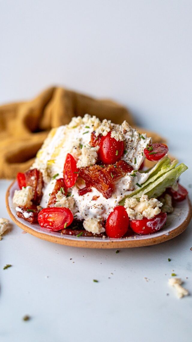 Meet our glowed up ⭐️ WEDGE SALAD ⭐️ 
INGREDIENTS 🕺⬇️🪩  8 slices thick cut bacon
1/4 cup brown sugar
1 1/4 cup smoked bleu cheese
1 cup sour cream
1/4 cup good quality mayonnaise
1/4 cup milk
1 tablespoon red wine vinegar
1 teaspoon Worcestershire sauce
1 clove garlic
2 tablespoon minced chives, plus extra for garnish
Diamond kosher salt
fresh cracked black pepper
1 head iceberg lettuce
1 cup cherry tomatoes, quartered  Get the full, printable recipe on femalefoodie.com or comment “WEDGE” and we’ll send the recipe straight to your DMs. ✌🏼  Recipe developed by @wildsaltstudio. 🫶🏼  #femalefoodie #femalefoodierecipe #femalefoodieretrorecipes #wedgesalad #saladrecipes #easysalad #30minutemeals #vintagerecipes